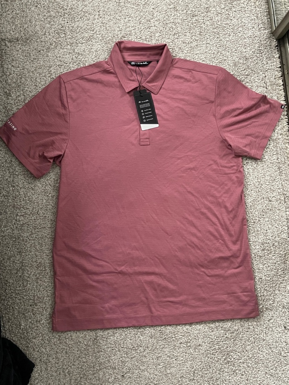 Travis Mathew side Larch RHONE Men’s Polo in Dusty Rose Mauve